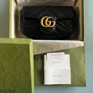 Authentic GG Marmont matelassé leather super mini bag. Excellent condition.